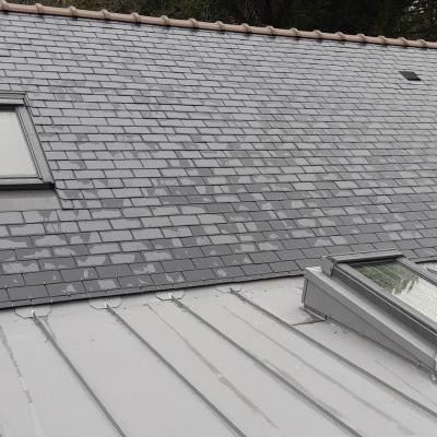 Pose d'une couverture en ardoises + Velux